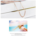 Women's heart-shaped pink artificial crystal pendant necklace on rose gold cross chain
