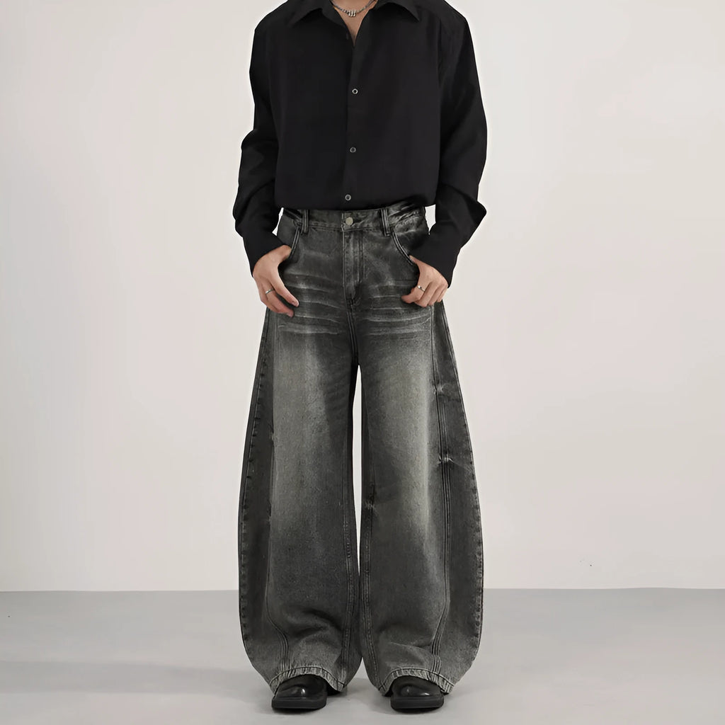 Men's denim straight leg jeans in black and gray washed finish with zip fly