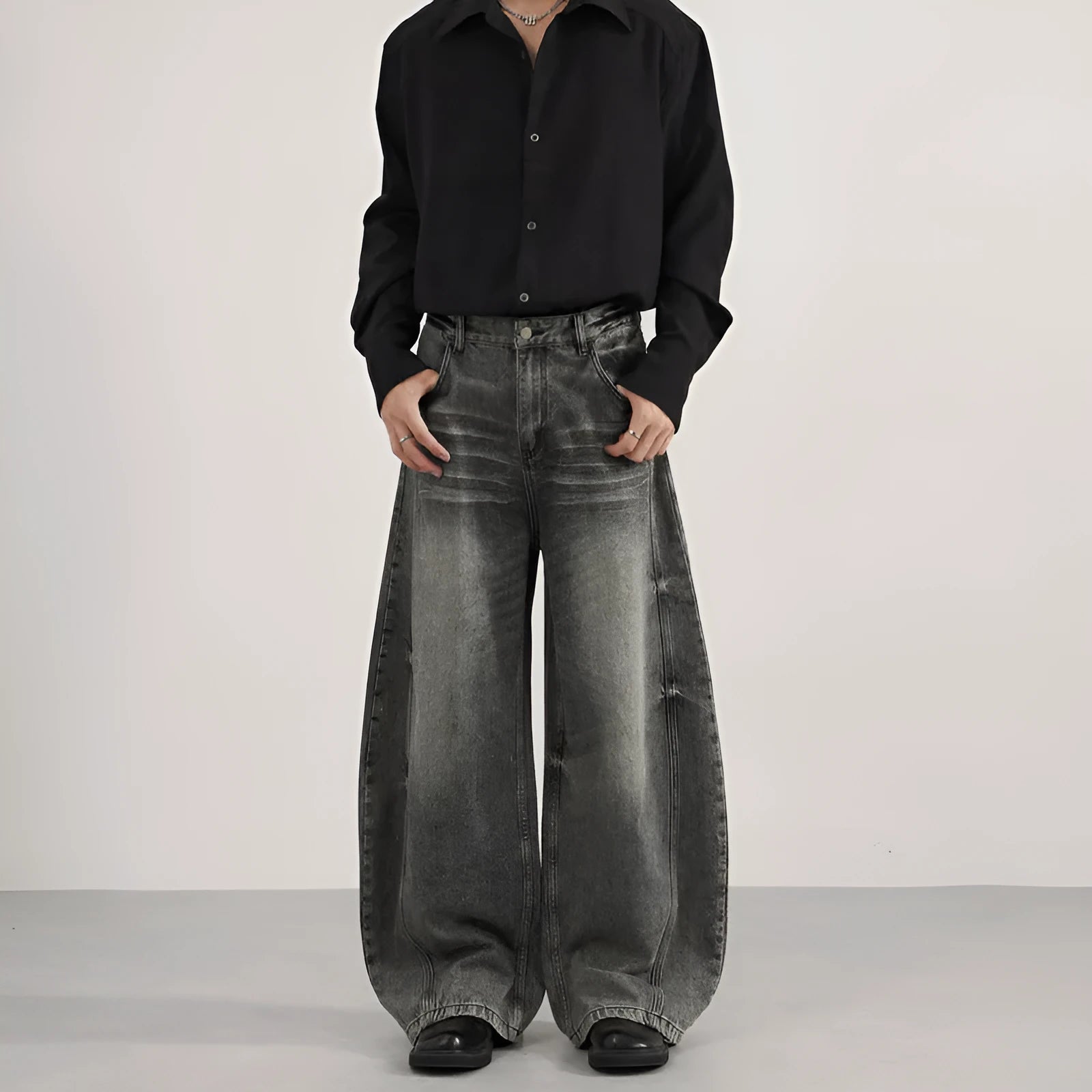 Men's denim straight leg jeans in black and gray washed finish with zip fly