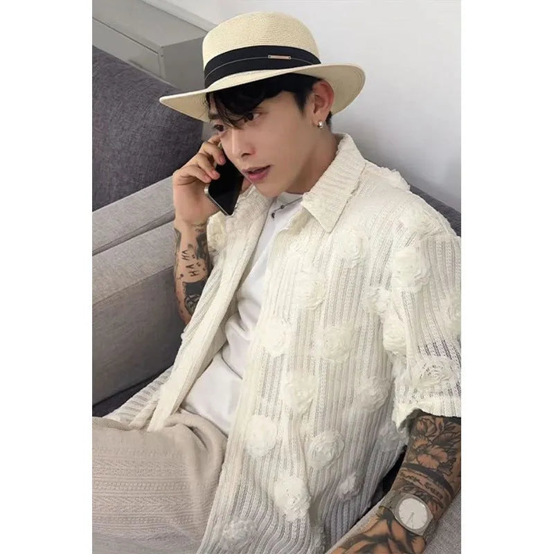 Men's loose fit short-sleeved shirt with a heavy industry floral print in milky white.