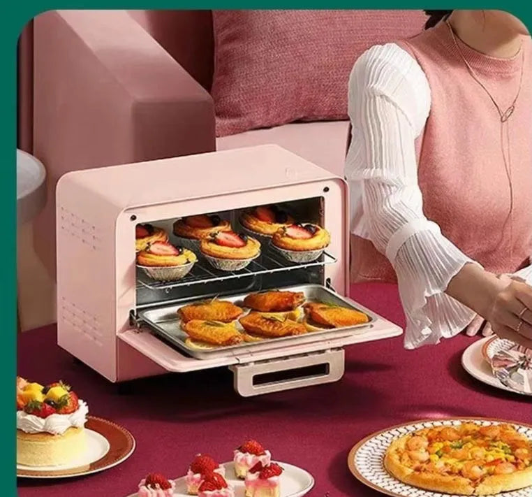 Pink home kitchen electric oven with up and down heating, 4-5 person capacity, 260x205x171mm, on countertop