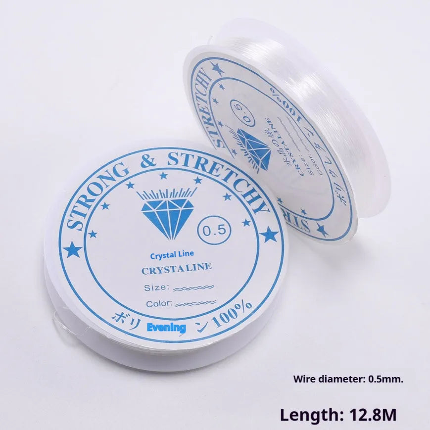 Transparent white elastic cord spool for DIY ornament accessories showing crystal fishing line material