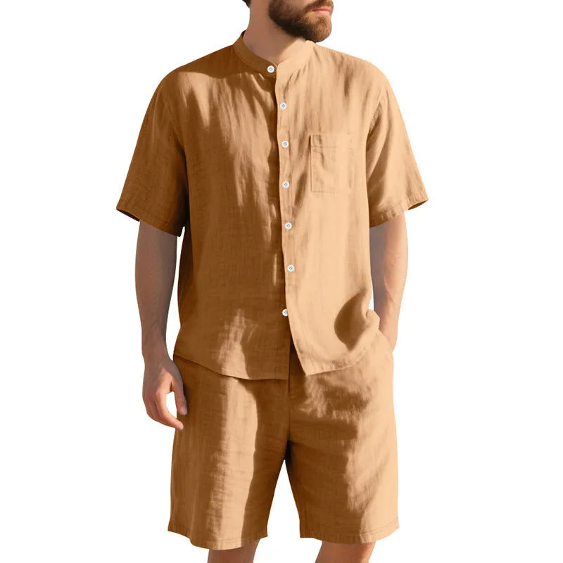 Men's light blue linen blend summer suit with henry collar shirt and shorts on a hanger.