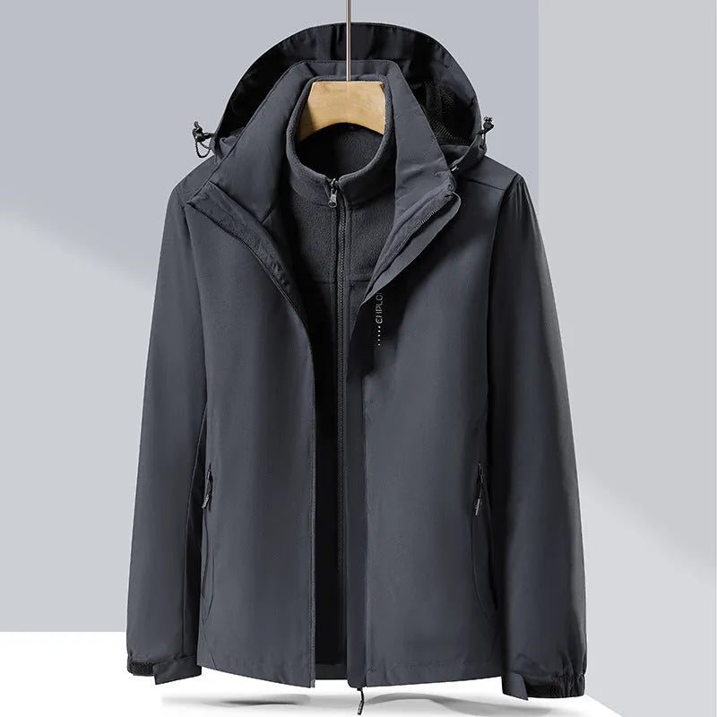 Men's removable two-piece waterproof mountaineering suit in various colours on a hanger.