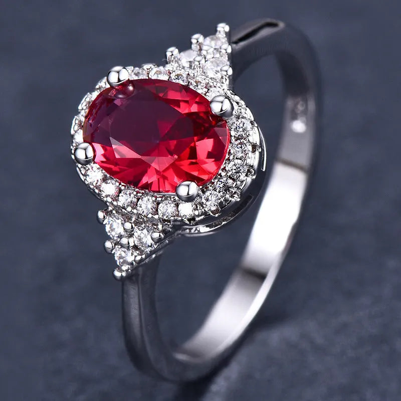 Oval ruby colour copper ring with adjustable open mouth design and white gold tone finish