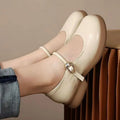 Flat fairy style leather shoes with wedge heel and round toe in black colour