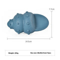 Blue rubber shark dog chew toy on a white background.