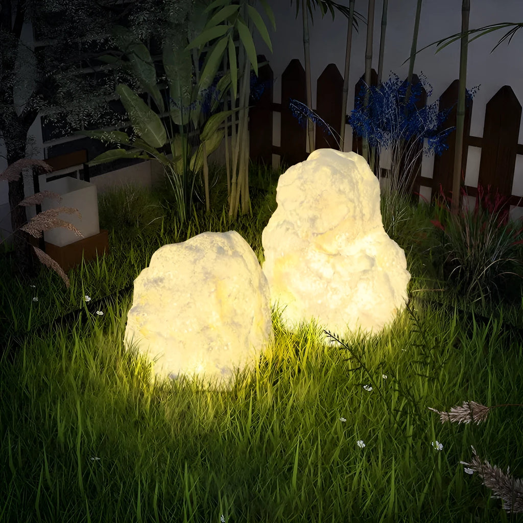 Outdoor waterproof stone resin floor lamp with warm light on garden pathway