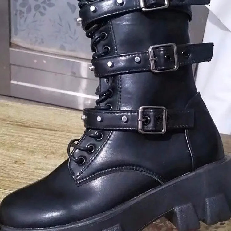 Black women's mid-calf boots with a metal buckle strap and side zip on a round toe.