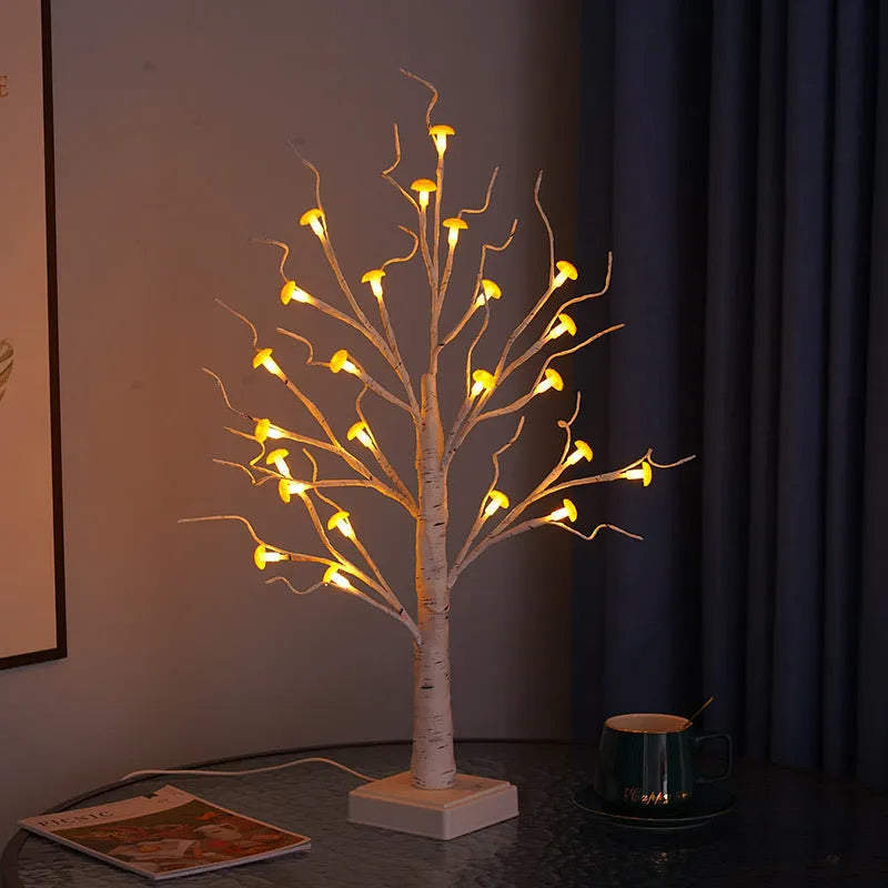 60cm tall white plastic birch tree lamp with small mushroom flowers and warm white LED light.