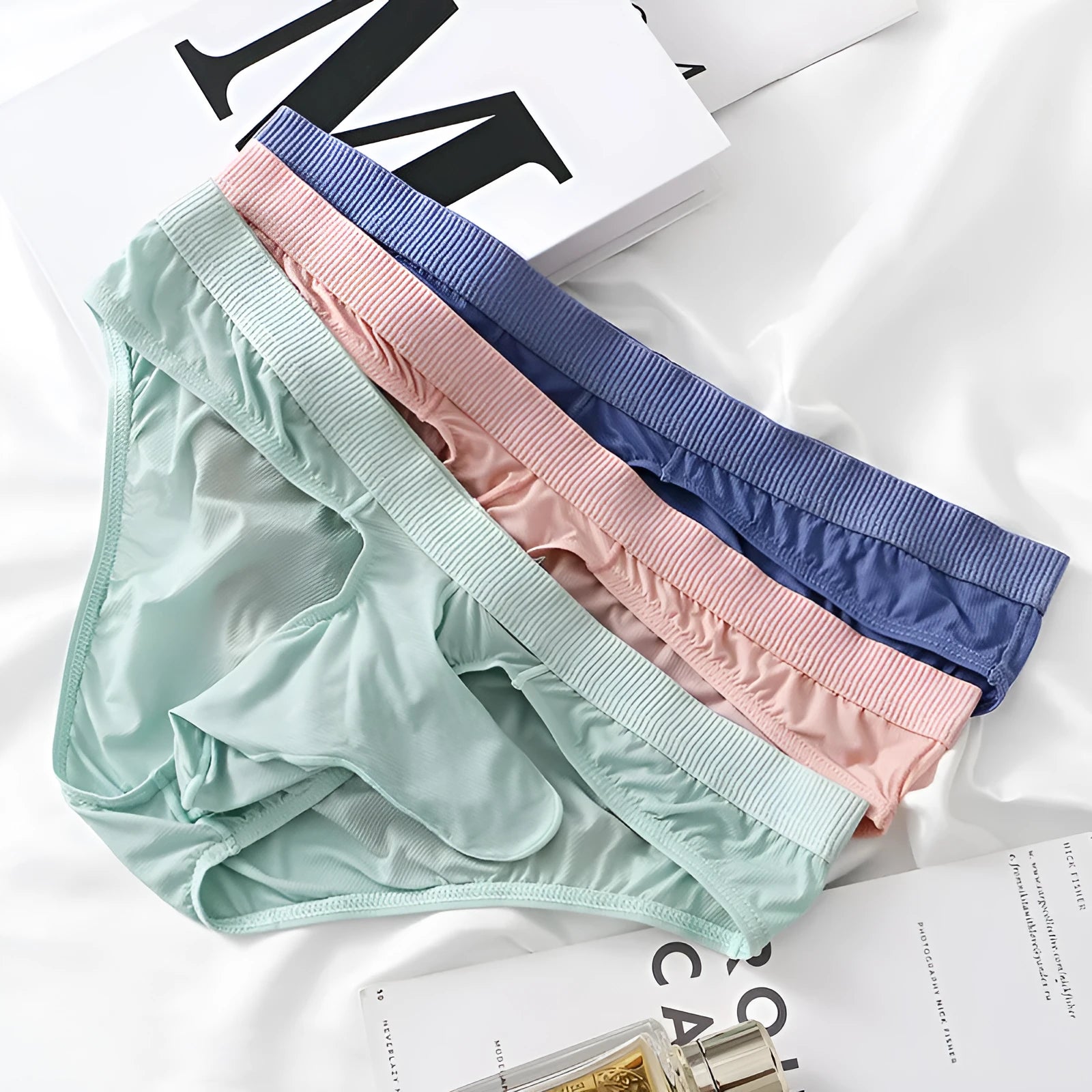 Men's low waist Ice Silk briefs in multiple colours showing the briefs style.
