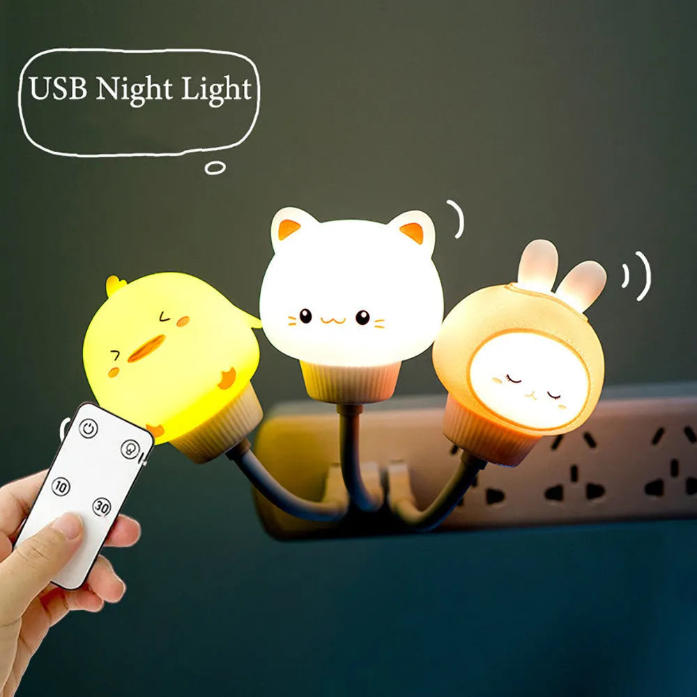 USB portable LED night light with remote control in cartoon bear design on bedside table