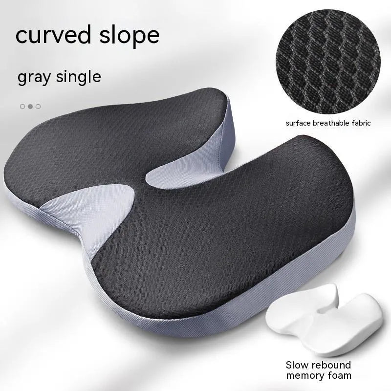Curved bevel seat cushion in solid colour with memory foam core for tailbone and driving support