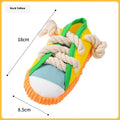 Colourful plastic dog chew toy with bends and a sound feature for interactive play.
