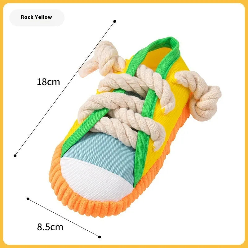 Colourful plastic dog chew toy with bends and a sound feature for interactive play.