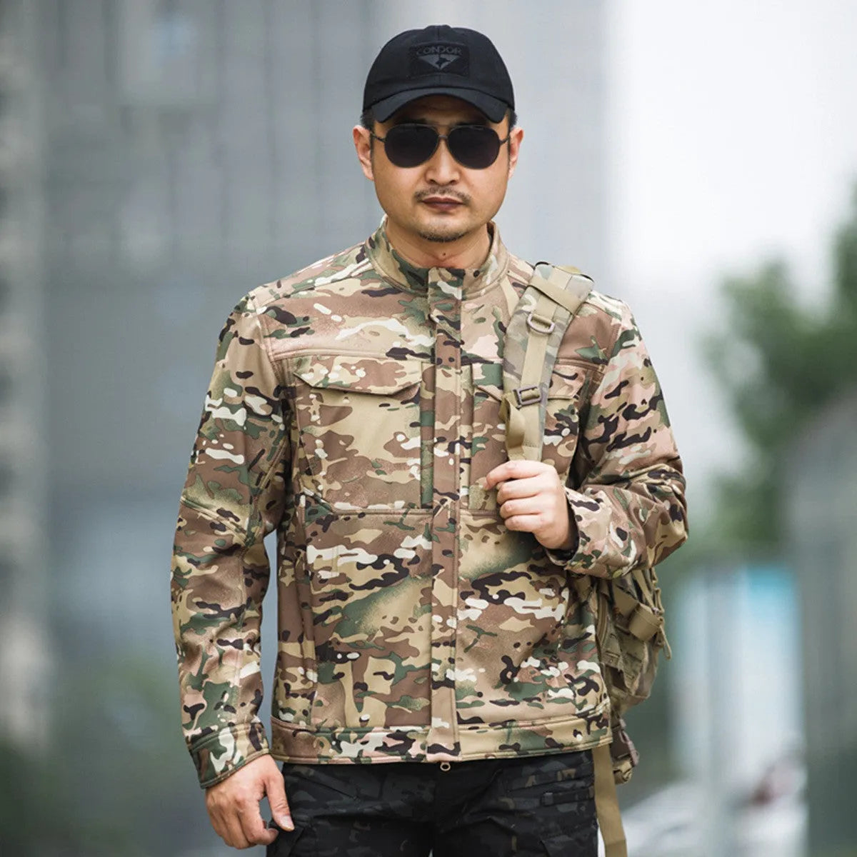 Bone Frog Peak Breaker soft shell tactical jacket in black camouflage for mountaineering.