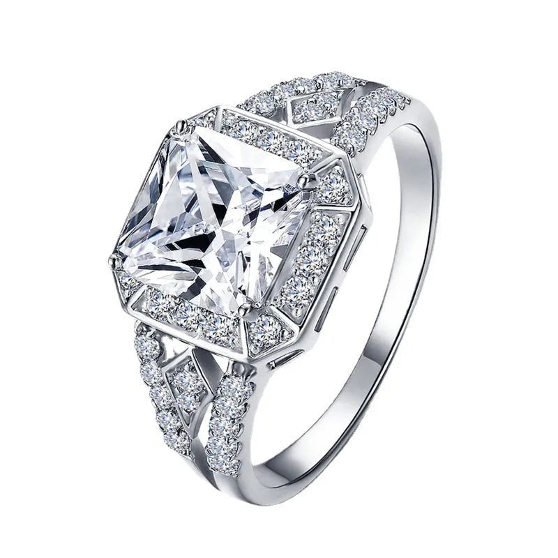 Geometric women's zircon ring with hollow design and platinum-colour finish shown from multiple angles
