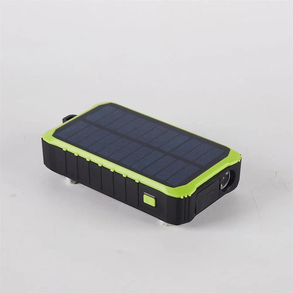 Green and orange hand crank solar power bank with unfolded solar panel and dual USB ports