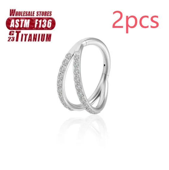 Titanium alloy fork nose ring in silver colour on a grey background