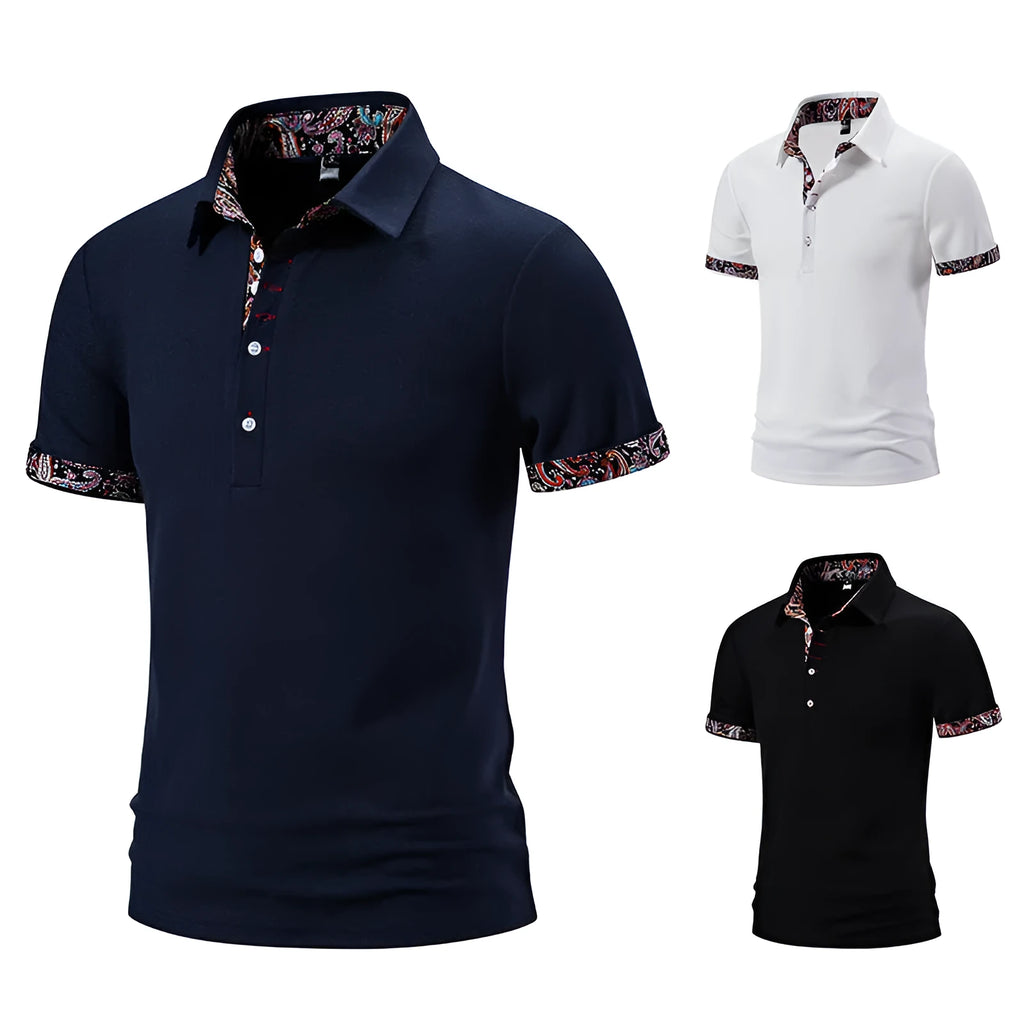 Men's navy blue polo shirt with colour block stitching on the chest and short sleeves.