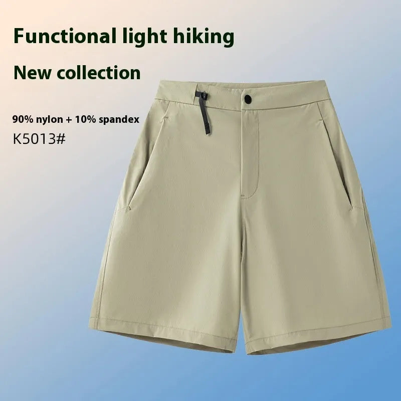 Man wearing khaki 3D cut sports shorts with four-way stretch fabric during a run.