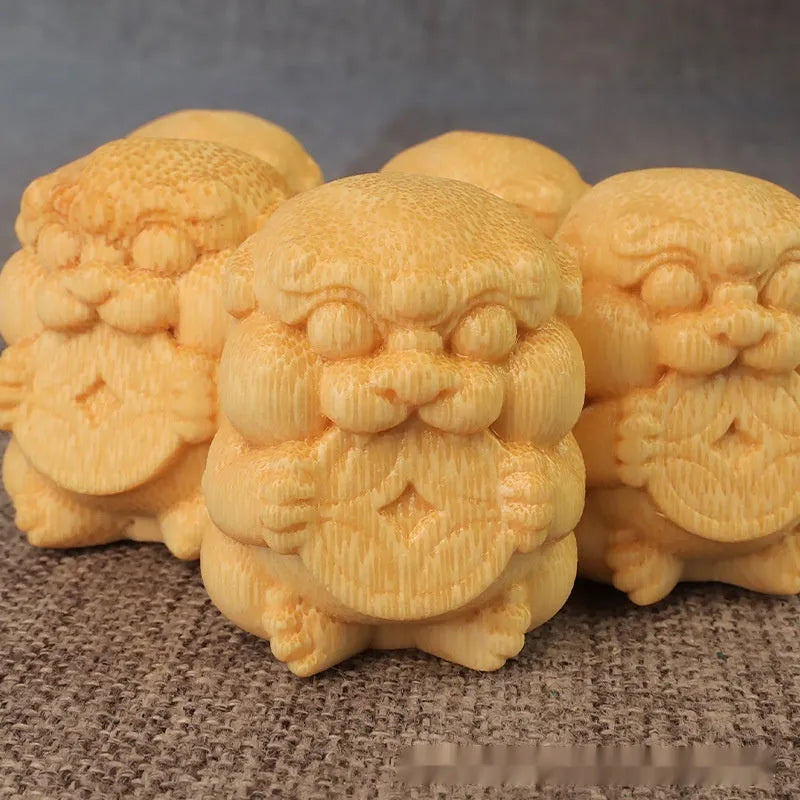 Solid bamboo carving ornament with take money motif measuring 4.5cm height