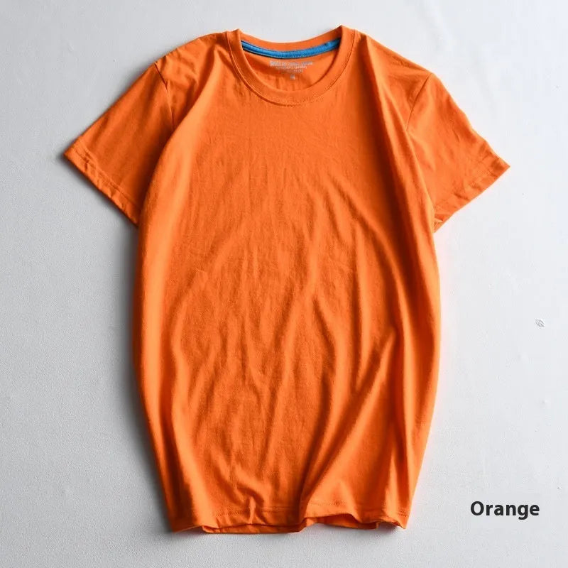 Men's solid colour combed cotton round neck t-shirt laid flat, showing short sleeves.
