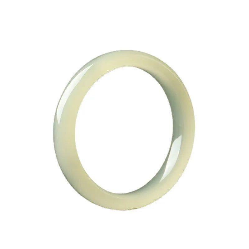 Natural ice silk jade round bar bracelet on a white background, showing its smooth texture and solid form.
