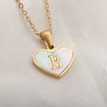 Gold plated heart-shaped white shell necklace with personalised text on a stainless steel chain.