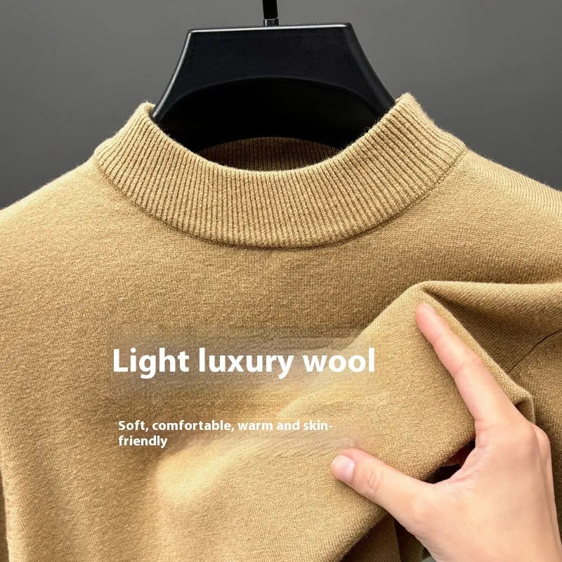 Men's fine wool half turtleneck sweater in a solid colour, showing long sleeves and regular fit.