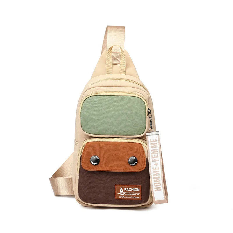 Outdoor leisure crossbody shoulder bag in nylon, shown in beige contrast colour with storage compartments.