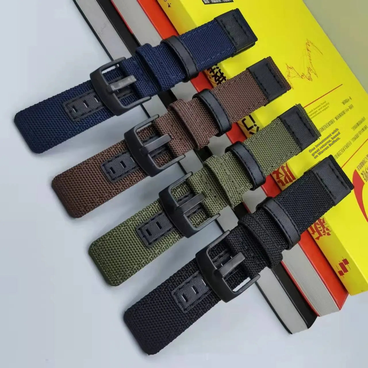Oxford cloth watch strap shown in multiple colours including camouflage, with 20mm, 22mm, and 24mm width options.