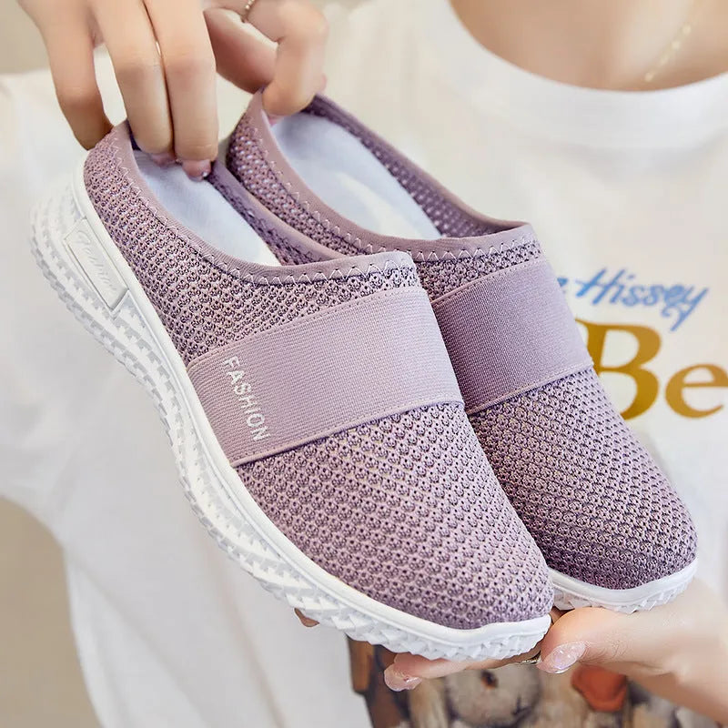 Women's mesh casual shoes with hollow-out design and flat heel in black colour