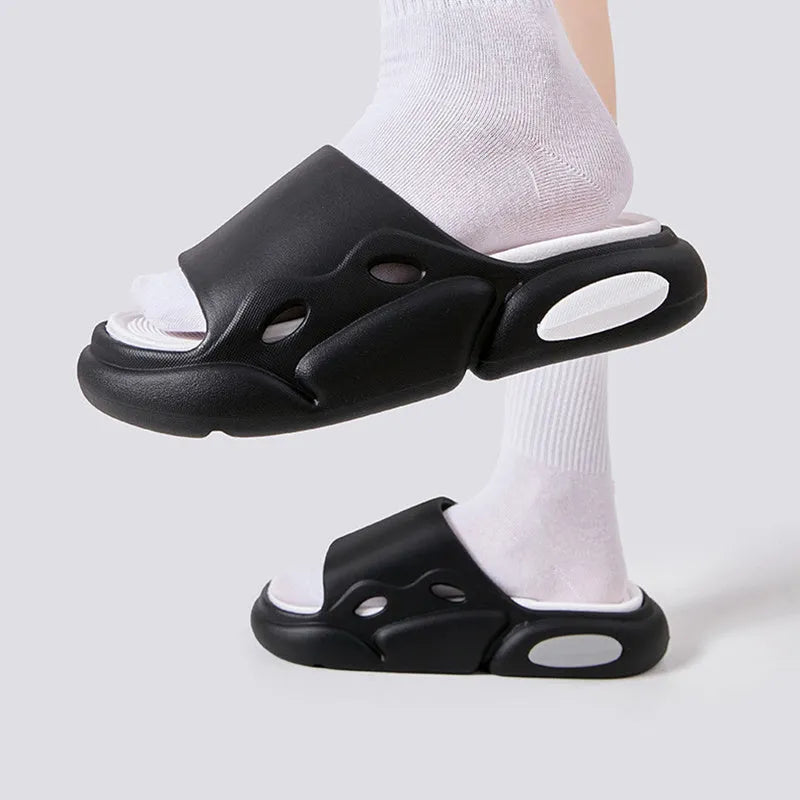 Two-colour EVA slippers with thick sole and leather lining in pink and purple.