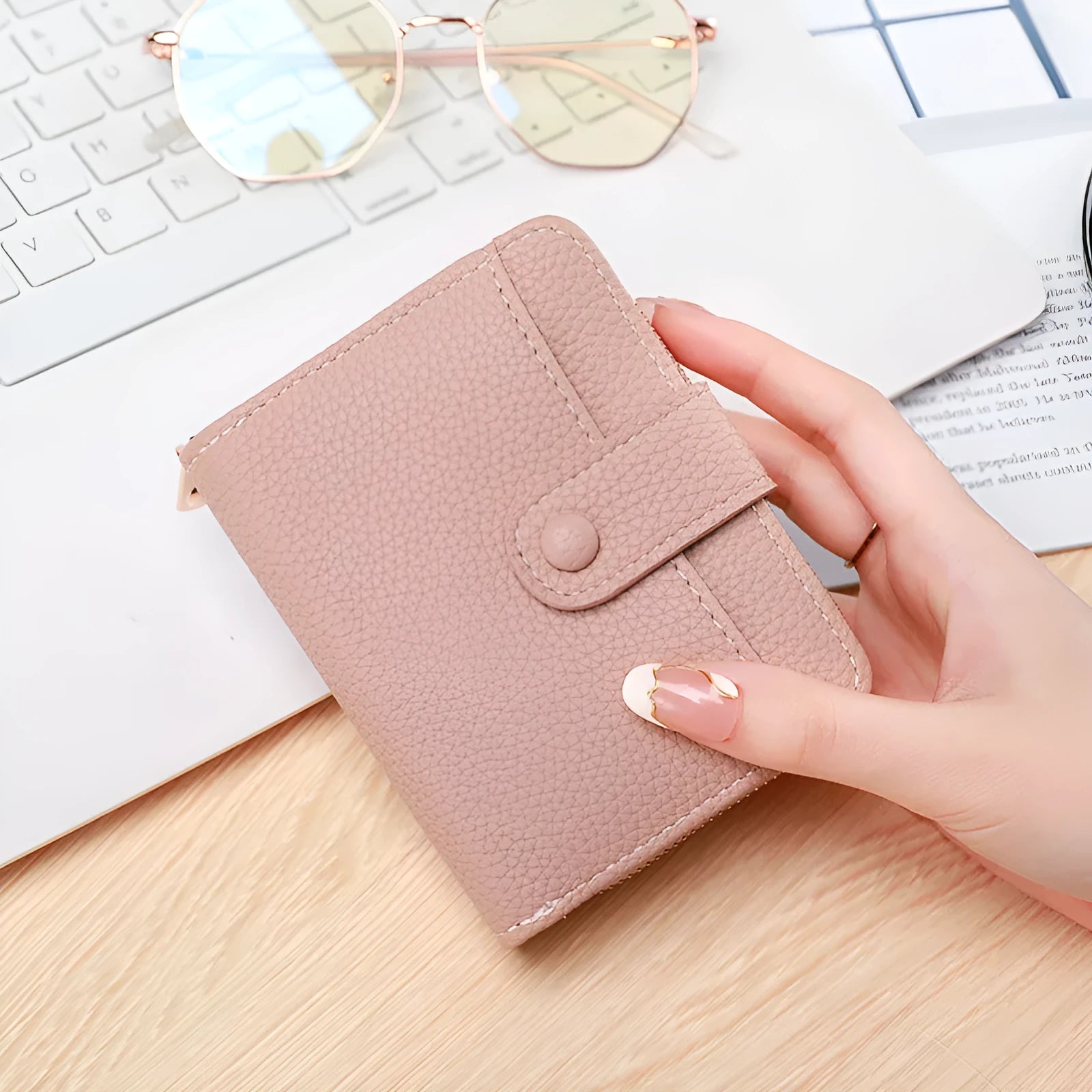 Ladies short wallet with lychee pattern in beige, pink, black and red colour options showing two-fold design