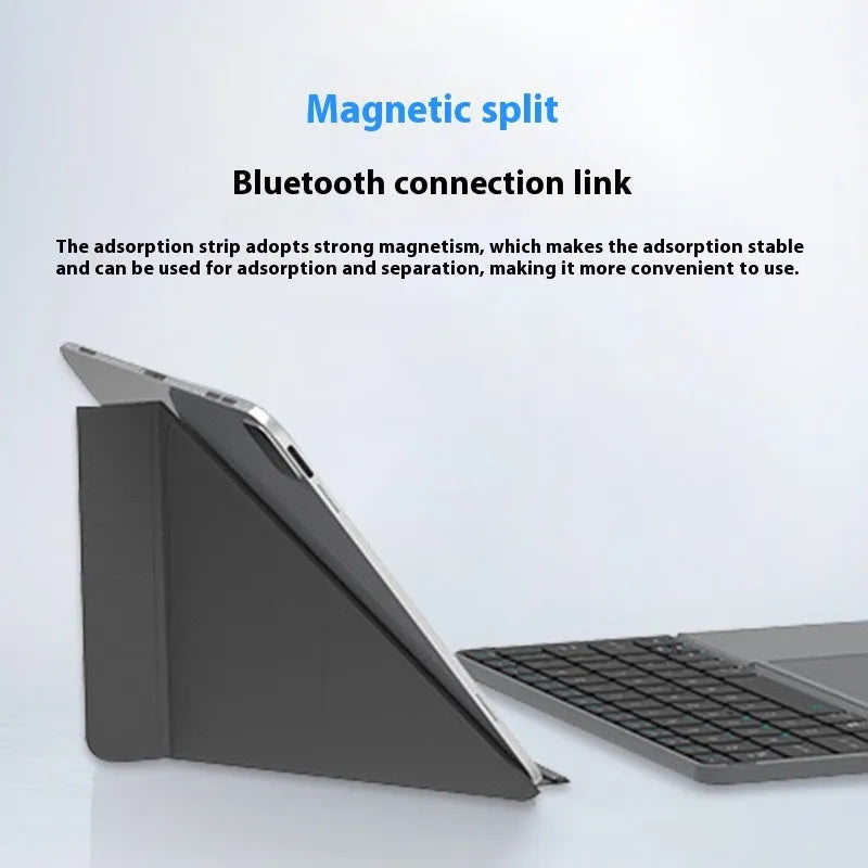 Grey wireless Bluetooth folding keyboard with phone slot open showing mobile device placement
