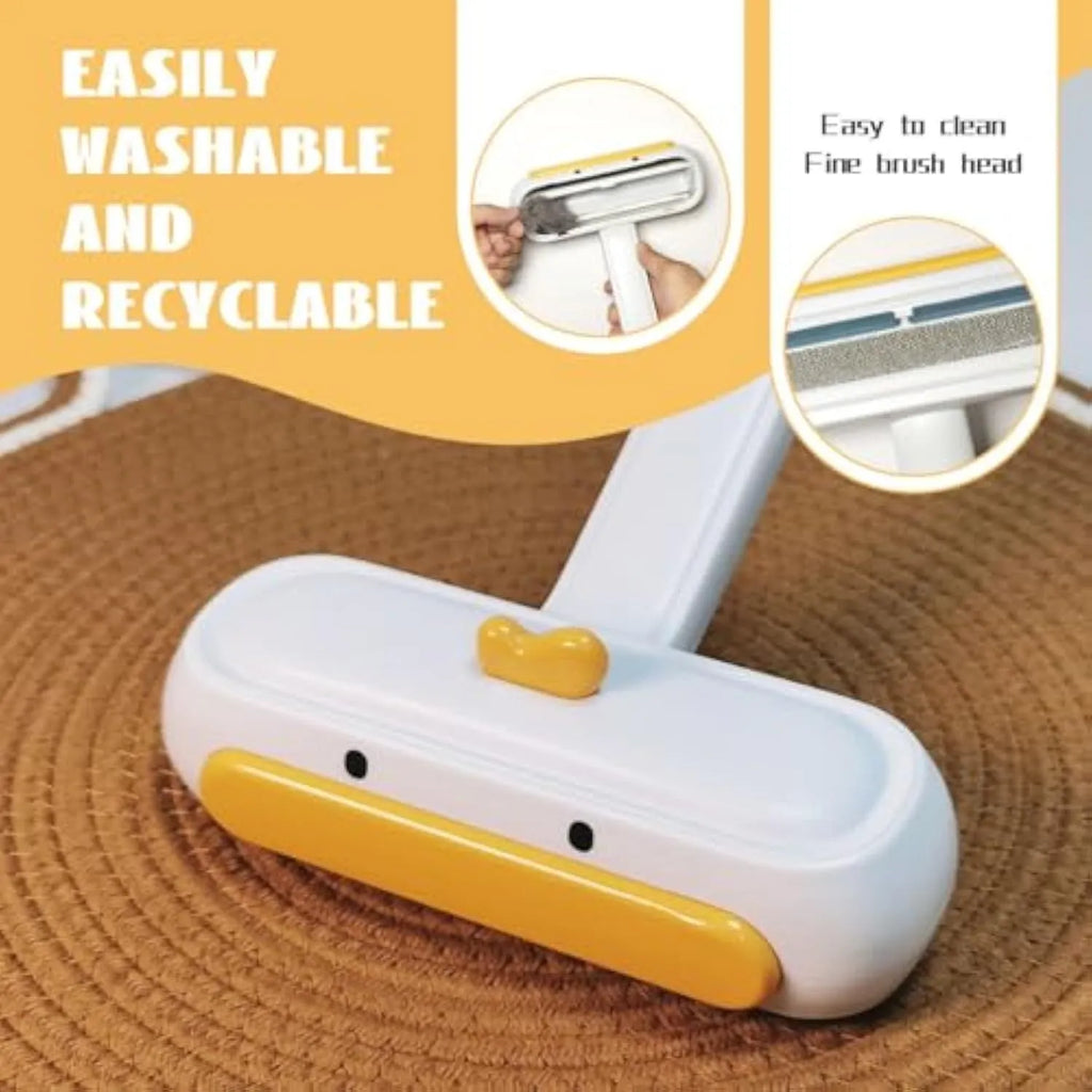 Yellow duck design portable pet hair removal hand roller with brush head.