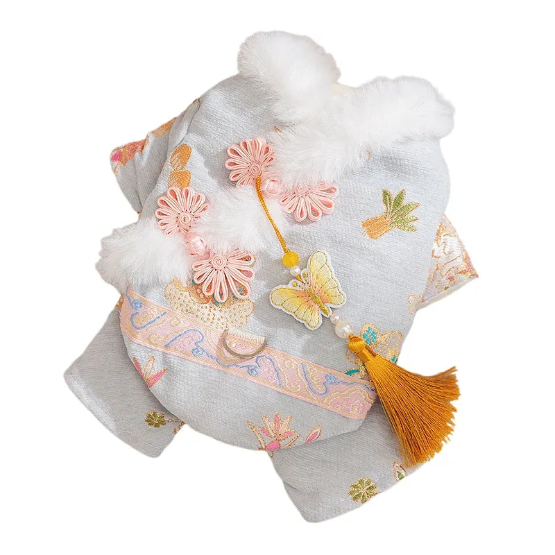 Red embroidered Tang suit for small dog with faux fur trim and tassels