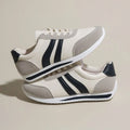 Red and blue lace-up sneakers with soft rubber soles and PU mesh upper