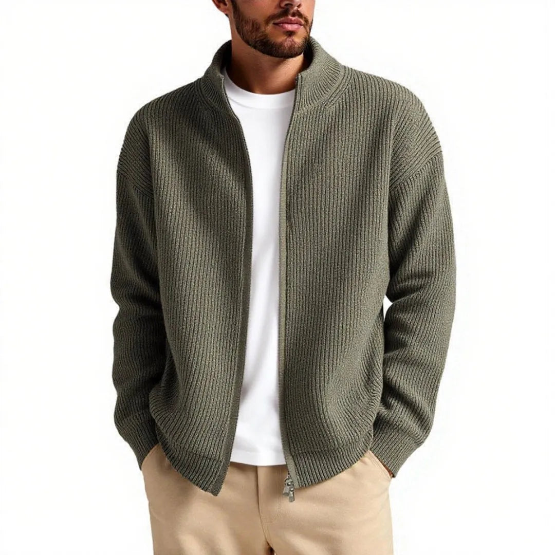 Man wearing a loose-fit grey cardigan sweater, a casual base layer for leisure wear.