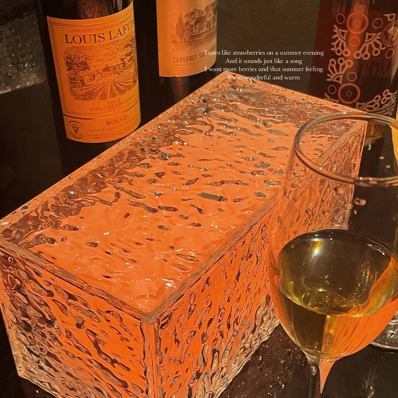 Geometric ice cube shaped acrylic night lamp with colour changing illumination on wooden surface