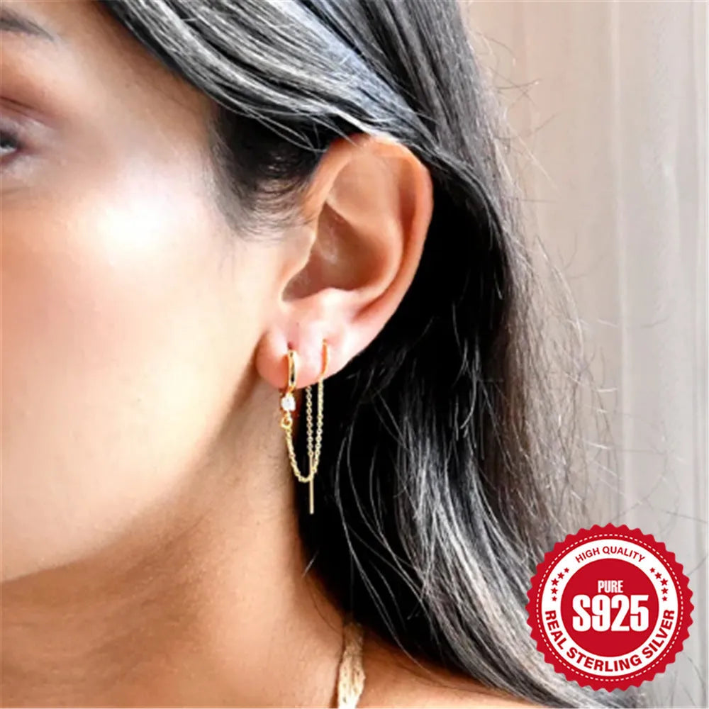 S925 sterling silver stud earrings with a diamond flower and tassel chain design in an electroplated gold finish.
