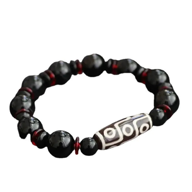Hand-woven black agate Dzi bead bracelet with 11mm geometric chalcedony beads