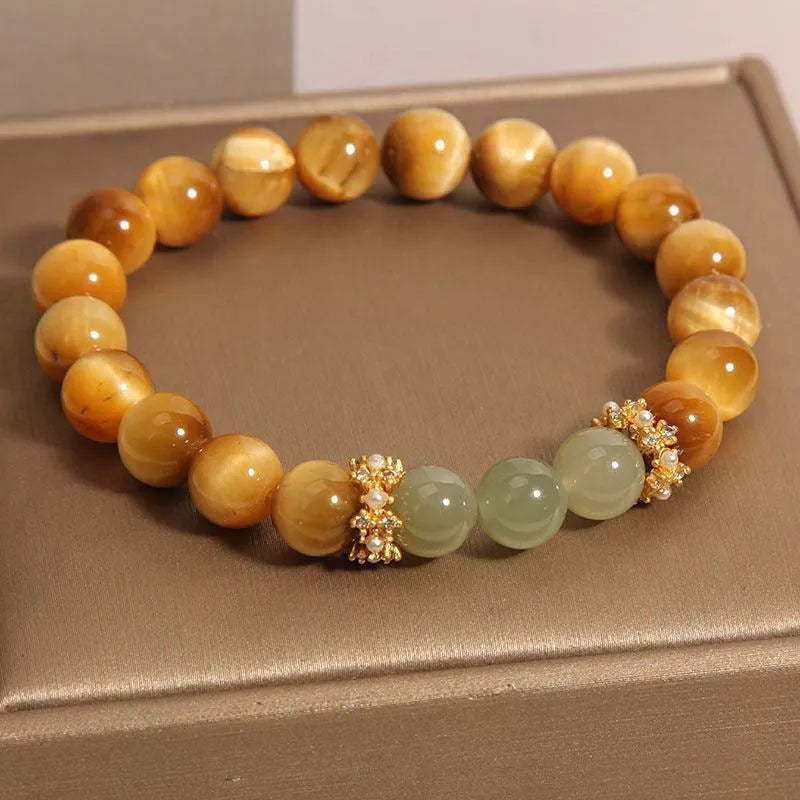 Natural yellow Tiger's Eye Hetian jade bracelet with gold gourd design and U-shaped form