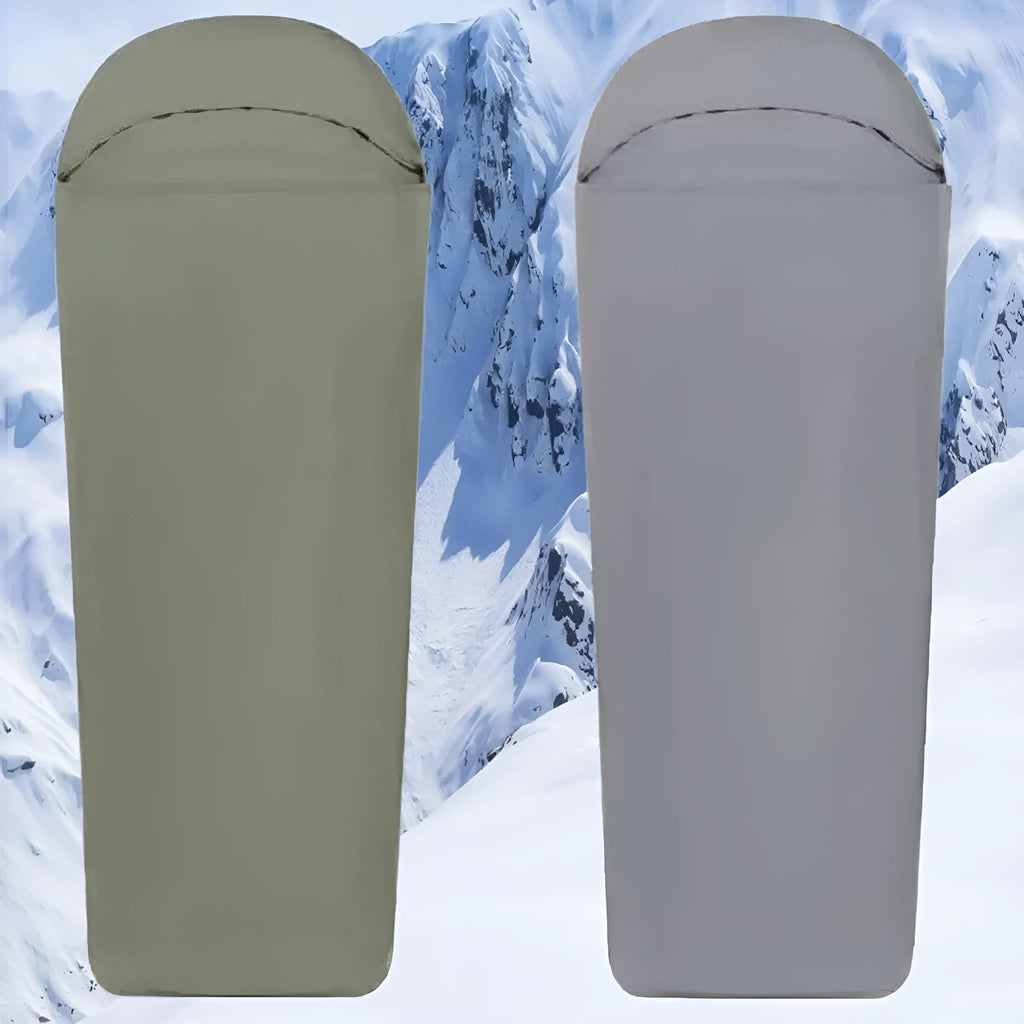 Blue mummy-style nylon sleeping bag unrolled, showing tapered design and matt fabric texture.