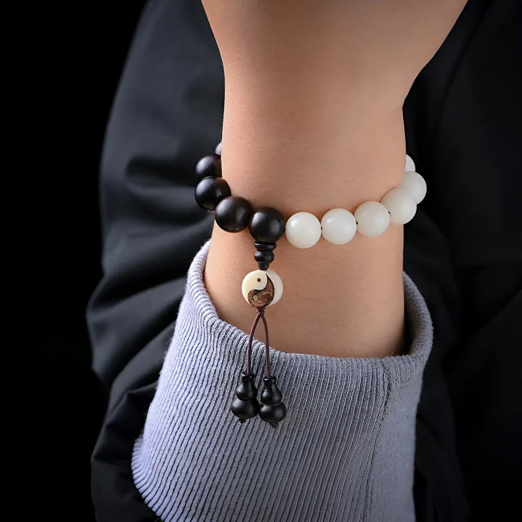 Handcrafted Bodhi bracelet with White Corypha and Blackwood eight-diagram beads