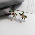 Sterling silver needle camellia earrings with contrast color alloy flower body for women