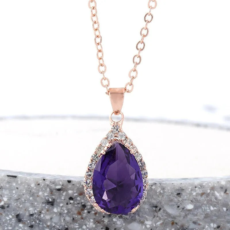 Women's drop-shaped rhinestone necklace in rose gold colour with geometric elements