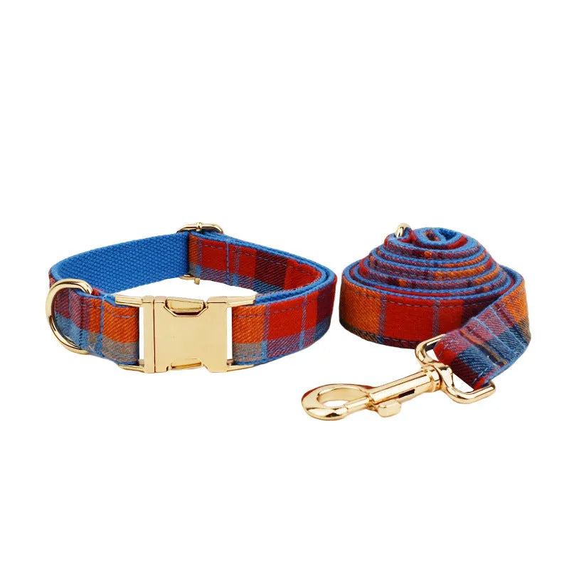 Blue background velvet plaid dog collar with matching hand-holding rope and optional bow accessory