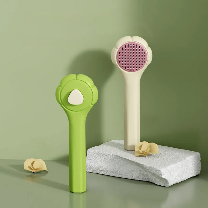 Floating needle comb for short-haired cats and dogs, 63g, in six colours including blue, green, pink, white and yellow.
